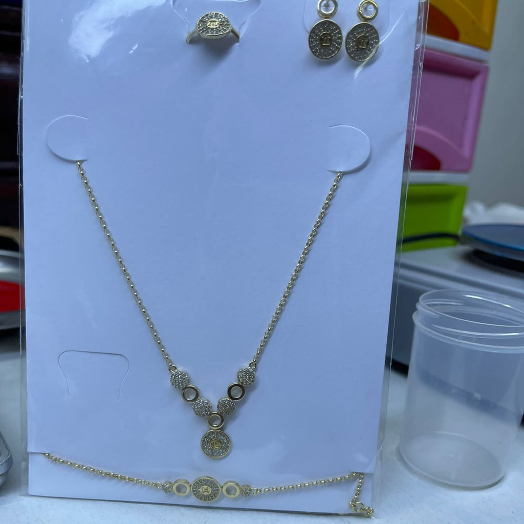 Parure Élégante Dorée Collier, Bracelet, Bague et Boucles d’Oreilles